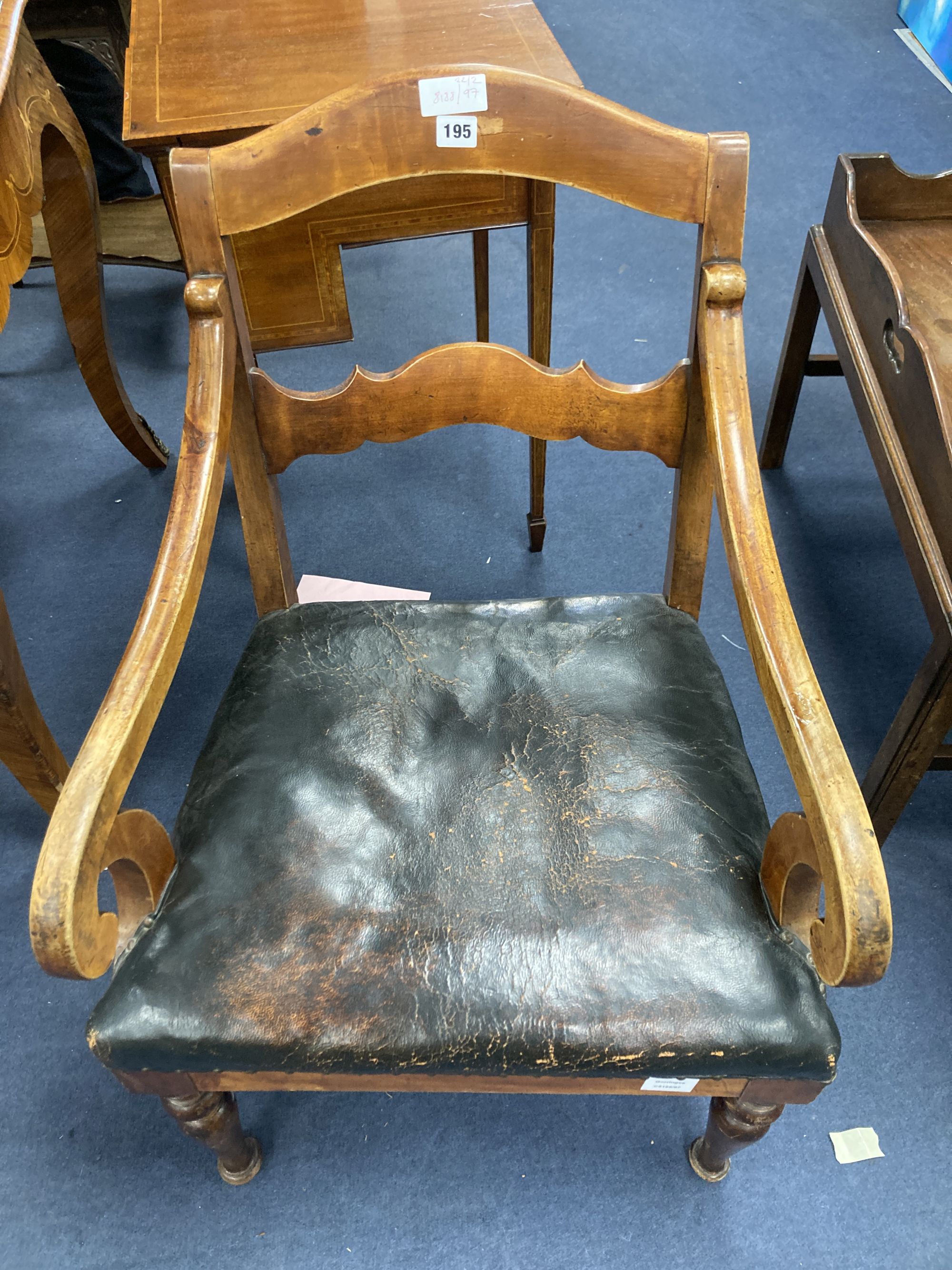 A 19th century Swedish fruitwood elbow chair